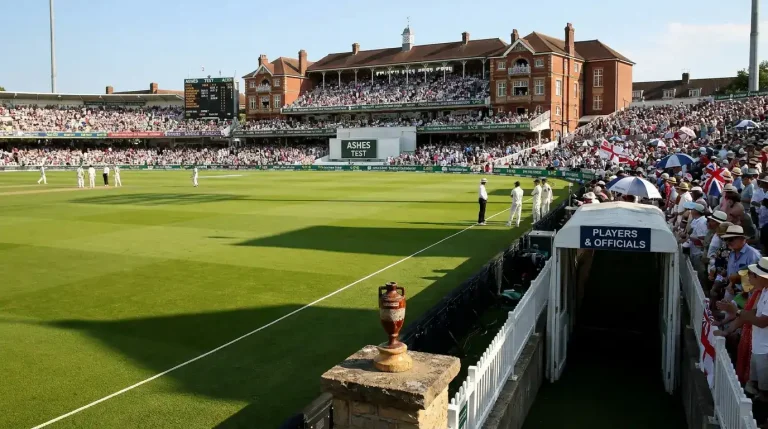 Packed English Test ground during an Ashes match with the iconic small urn replica displayed near the players' tunnel