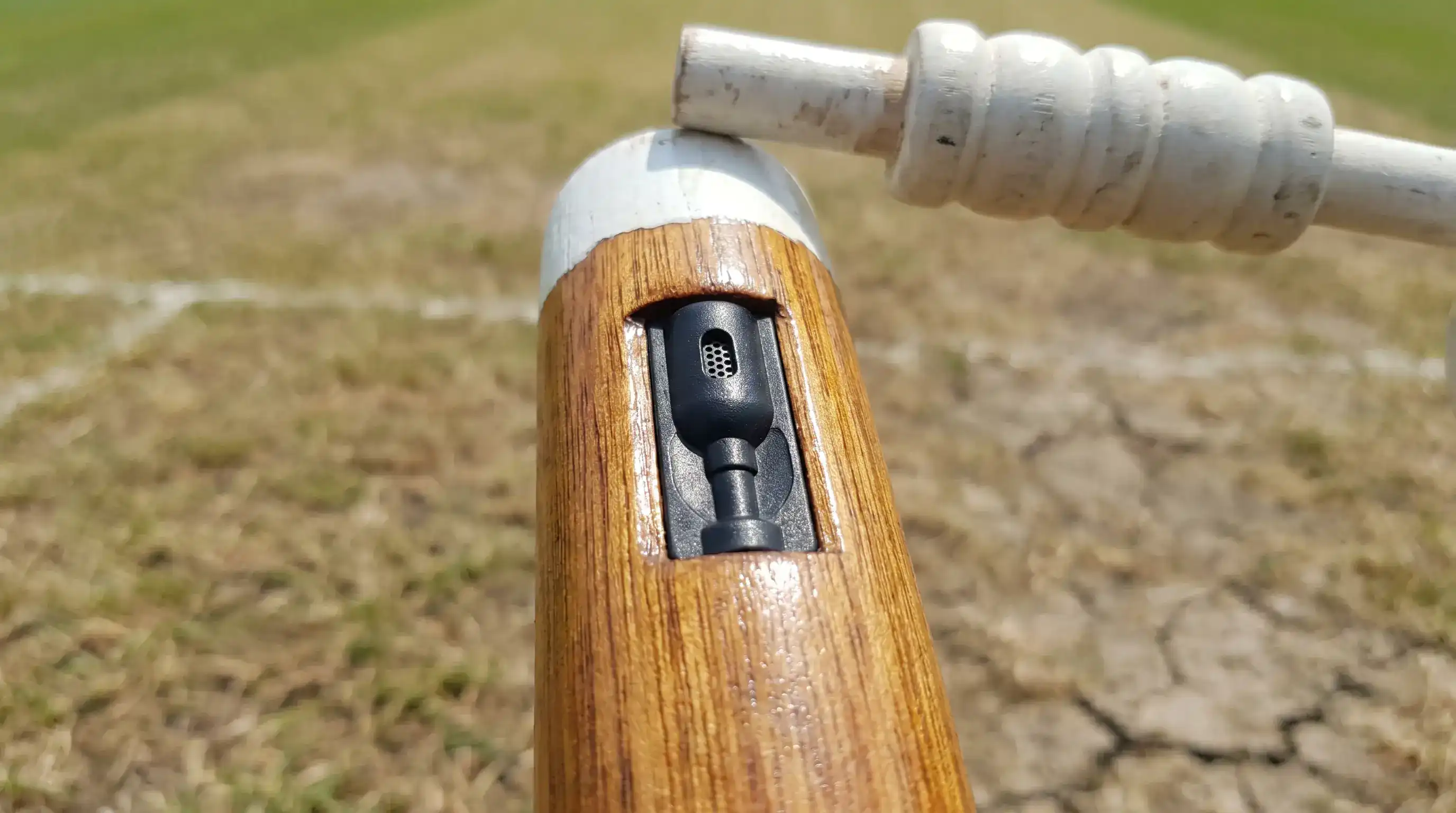 Close-up of stump microphone embedded in the wicket capturing bat-on-ball audio