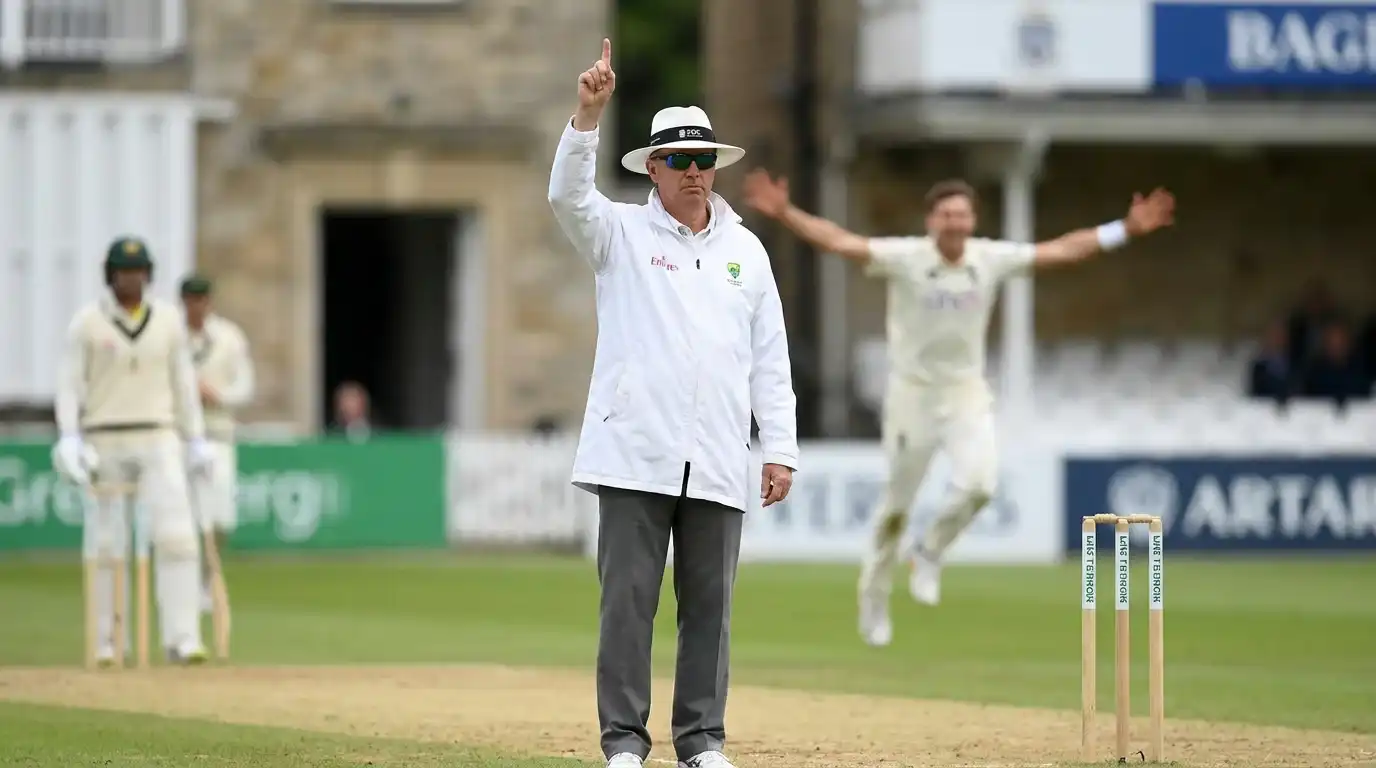 On-field umpire raising the finger on an lbw appeal during a Test match