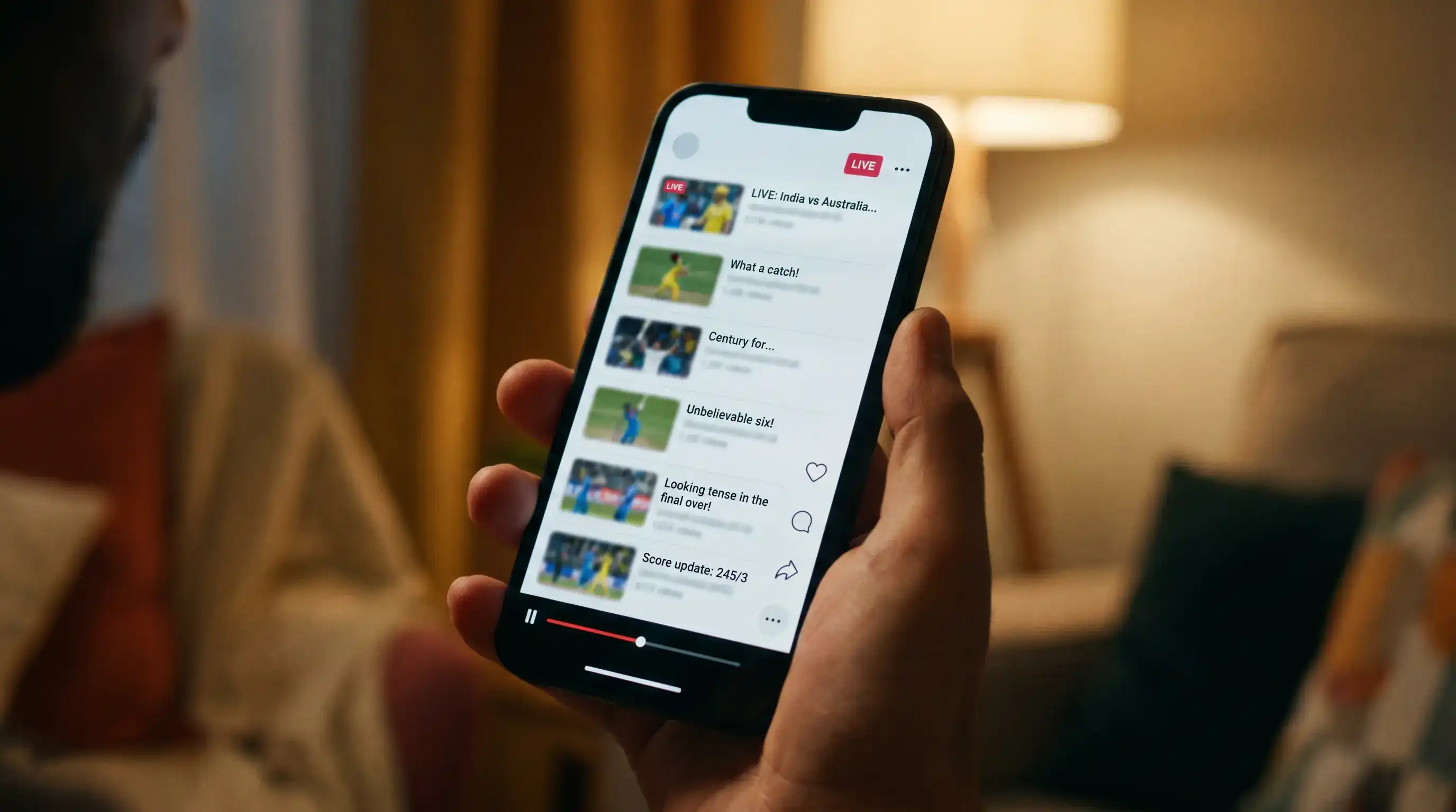 Smartphone screen showing a cricket social-media feed with a stream of live posts during a Test match session