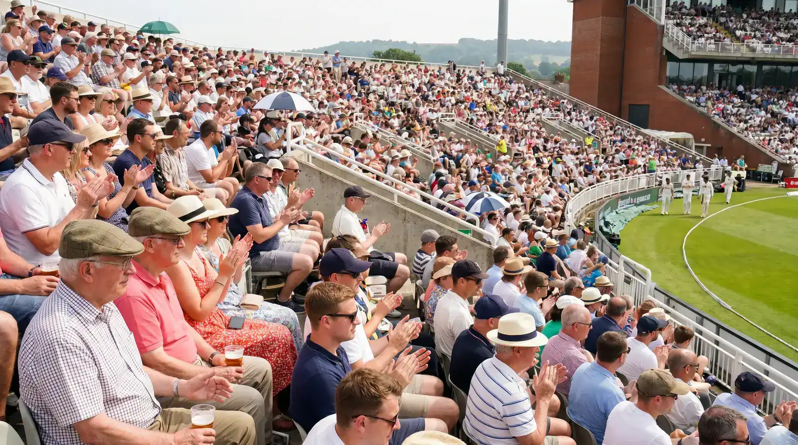 International Test match crowd at an English ground with diverse spectators in the upper tiers during the afternoon session
